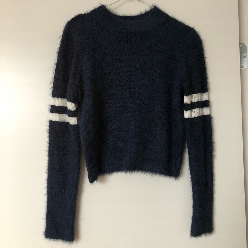 Dillard’s navy blue and sporty sweater